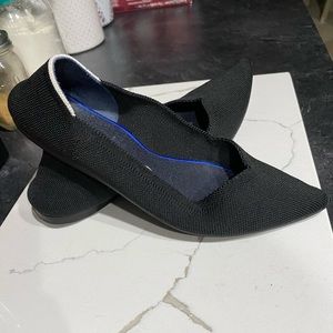 Black Rothy’s pointed-toe flats